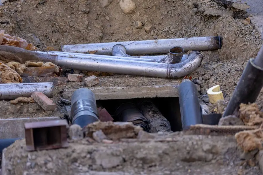 An exposed line being worked on outdoors