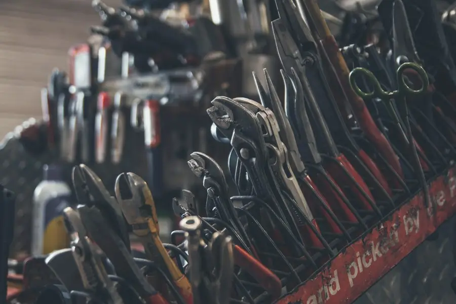 A tray of pipe wrenches and drain tools