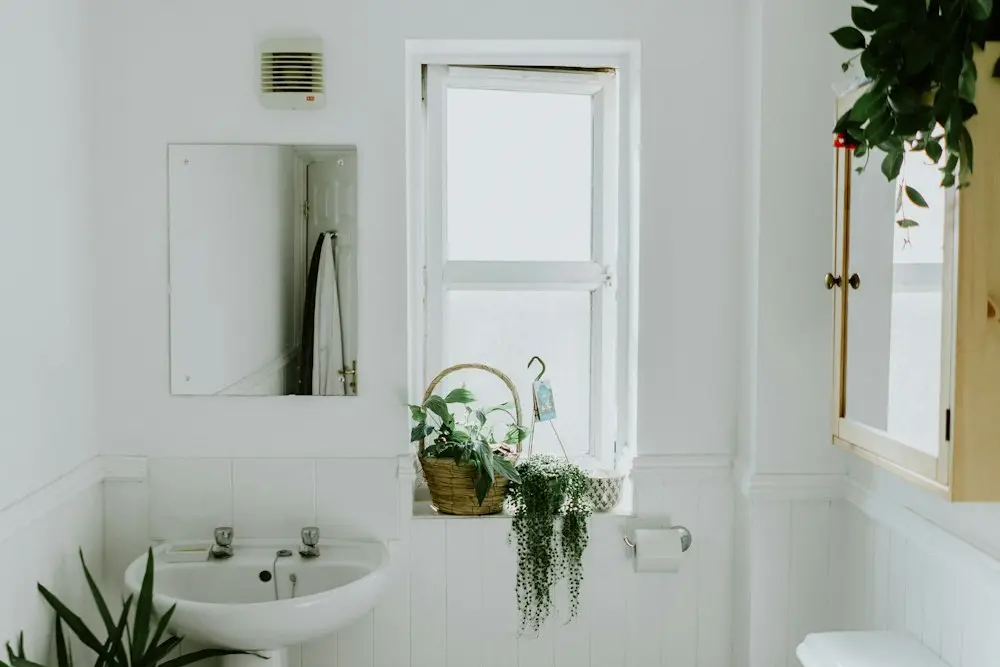 A bathroom sink and toilet