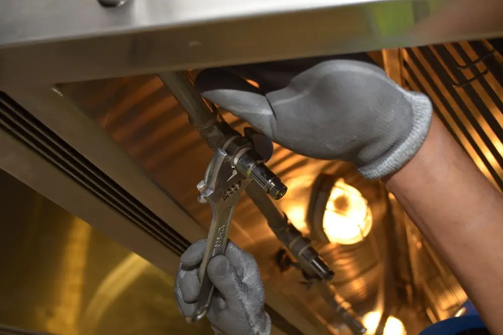 Under-sink drain work with a wrench
